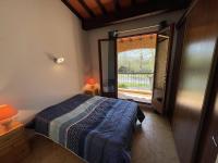Łóżko lub łóżka w pokoju w obiekcie Villa T3 avec garage, terrasse, piscine et Wifi - 6 couchages à Saint-Cyprien, proche plage et commerces - FR-1-106-89
