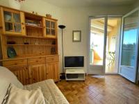 Telewizja i/lub zestaw kina domowego w obiekcie Appartement 2 pièces à Argelès-sur-Mer, 300m de la plage, terrasse, parking, animaux acceptés - FR-1-225-771
