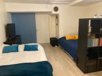Posteľ alebo postele v izbe v ubytovaní Une chambre chez nous, à 12 minutes de Paris