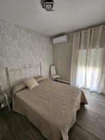 Postel nebo postele na pokoji v ubytování Casa Rural A la Vera de Monfrague