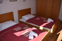 Postel nebo postele na pokoji v ubytování Aparthotel Snjezna Kraljica