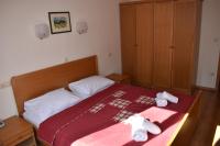 Postel nebo postele na pokoji v ubytování Aparthotel Snjezna Kraljica