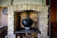 a brick oven with a pot on top of it at Maison 5 chambres #8pers #Stationnement gratuit in Cognac