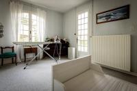 a room with a table and a desk in it at Maison 5 chambres #8pers #Stationnement gratuit in Cognac