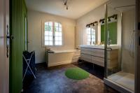 a bathroom with a tub and a sink and a shower at Maison 5 chambres #8pers #Stationnement gratuit in Cognac