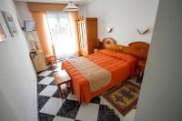 Postel nebo postele na pokoji v ubytování Hotel Mediante