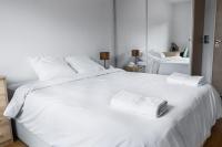 Posteľ alebo postele v izbe v ubytovaní Convenient 2BR Apt near subway
