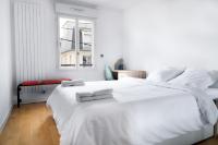 Posteľ alebo postele v izbe v ubytovaní Convenient 2BR Apt near subway
