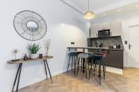 Kuchyňa alebo kuchynka v ubytovaní HSH Saint Lazare-Opéra Calm & Cosy Apartment