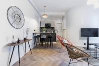 Televízia a/alebo spoločenská miestnosť v ubytovaní HSH Saint Lazare-Opéra Calm & Cosy Apartment