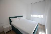 A bed or beds in a room at D Suite Fronte Mare