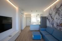 A television and/or entertainment centre at D Suite Fronte Mare