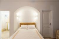 Postel nebo postele na pokoji v ubytování Mykonos Psarou Place