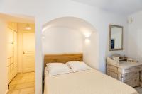 Postel nebo postele na pokoji v ubytování Mykonos Psarou Place