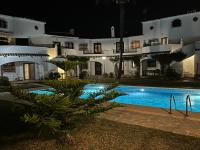 Bazén v ubytování Apartamento Urb Oasis Park II Denia, las Marinas nebo v jeho okolí