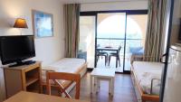 Televízia a/alebo spoločenská miestnosť v ubytovaní Appartement 616, 5 personnes belle vue Mer By Palmazur Vacances