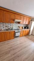 Kuchyňa alebo kuchynka v ubytovaní Pokoje i apartament z widokiem na Tatry