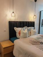 Posteľ alebo postele v izbe v ubytovaní Cosy Appartement T2 proche Paris