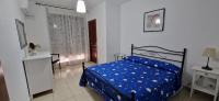 Posteľ alebo postele v izbe v ubytovaní White Apartment