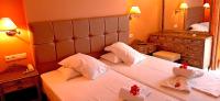 Posteľ alebo postele v izbe v ubytovaní Mitho Hotel Spa