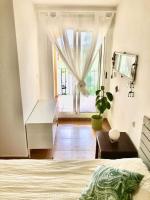 Postel nebo postele na pokoji v ubytování Bella Vista