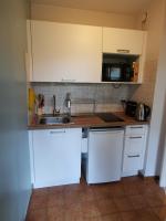 Kuchnia lub aneks kuchenny w obiekcie Appartement au calme (2 à 4 Pers.) avec Piscines + Parking