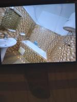 Le TOUNKARANKE residence FASSO KANU- villa-にあるテレビまたはエンターテインメントセンター