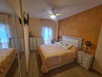 Posteľ alebo postele v izbe v ubytovaní Apartamento cerca del mar