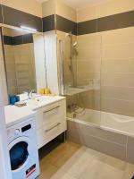 Kúpeľňa v ubytovaní Appartement T3 Confluence