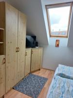 Łóżko lub łóżka w pokoju w obiekcie Apartmancentrum