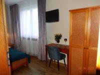Televízia a/alebo spoločenská miestnosť v ubytovaní APARTAMENTY PASJA -2 minuty do plaży