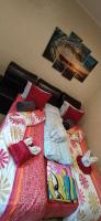A bed or beds in a room at Velvita Sliven