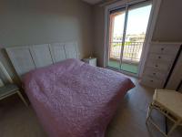Posteľ alebo postele v izbe v ubytovaní Appartement 2 pièces climatisé en front de mer au Grau d'Agde avec terrasse et accès direct à la plage - FR-1-423-275