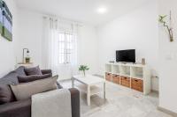 TV a/nebo společenská místnost v ubytování Ruiz Gijón Elegante y moderno en la Sevilla más autentica