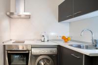 Kuchyň nebo kuchyňský kout v ubytování Suites Maestranza - Refinadores by Magno Apartments