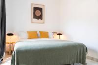 Postel nebo postele na pokoji v ubytování Suites Maestranza - Refinadores by Magno Apartments