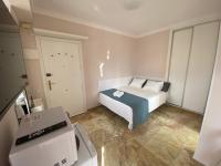Postel nebo postele na pokoji v ubytování Cozy studio centr Torremolinos