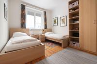A bed or beds in a room at Im Herzen von Wien