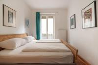 A bed or beds in a room at Im Herzen von Wien