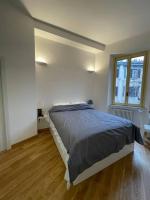 A bed or beds in a room at Luxury apartment - Porta Venezia
