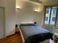 A bed or beds in a room at Luxury apartment - Porta Venezia