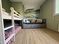 Posteľ alebo postele v izbe v ubytovaní Maison Les Géraniums