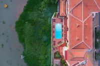 an overhead view of a building with a swimming pool at Victoria Chau Doc Hotel in Chau Doc