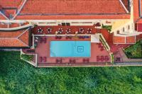 an overhead view of a building with a swimming pool at Victoria Chau Doc Hotel in Chau Doc