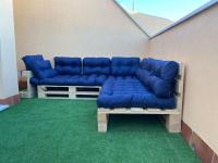 A seating area at Apartamento Atico Duplex de 1 dorm en Tarifa