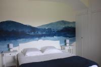 Posteľ alebo postele v izbe v ubytovaní Villa Le Printemps, maison 15 pers avec piscine