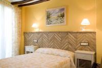 Postel nebo postele na pokoji v ubytování Hotel Rural El Pilaret