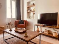 Televízia a/alebo spoločenská miestnosť v ubytovaní Appartement Carré d’Or Nice