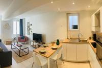Televízia a/alebo spoločenská miestnosť v ubytovaní Appartement Carré d’Or Nice