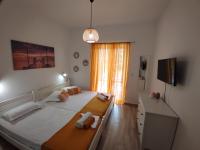 Posteľ alebo postele v izbe v ubytovaní ANGEL STUDIOS VRACHOS BEACH PREVEZA